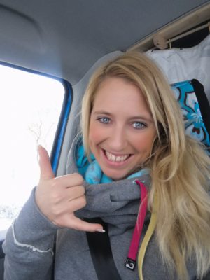 Nadine Waving Shaka While Riding The Bus