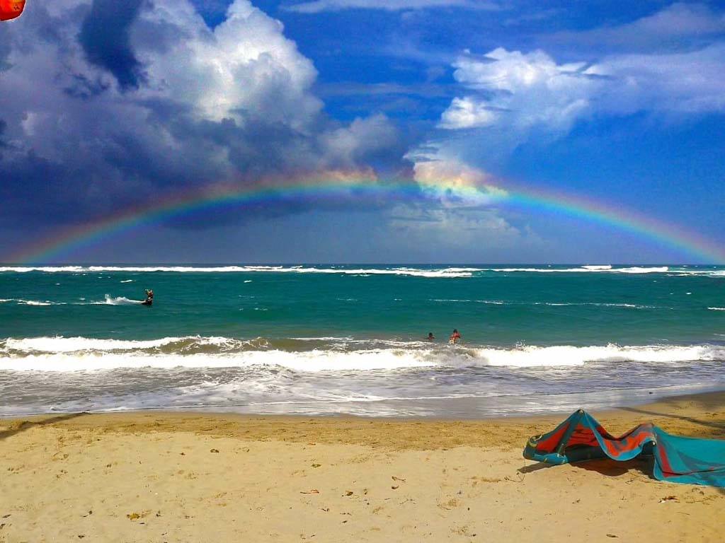 Rainbow Over KiteSurf Dominican Republic Beach Sunshine With Kite Laying On The Beach
